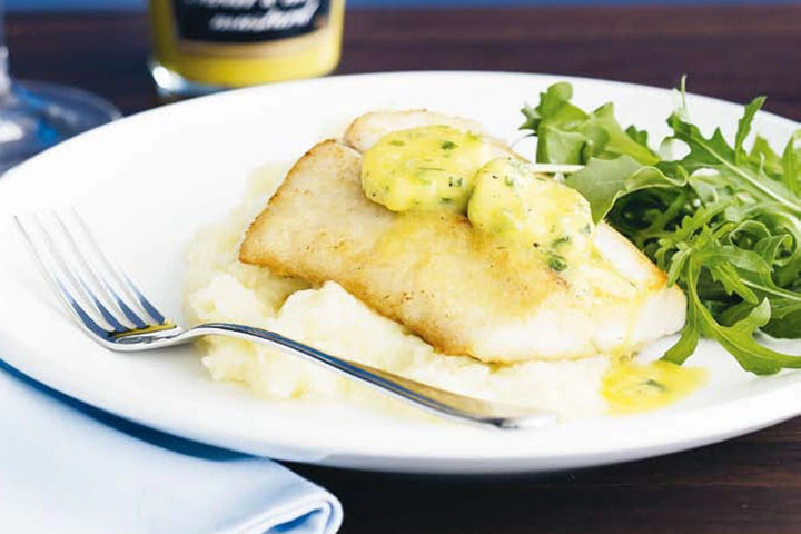White Fish on Potato Mash with Butter Sauce & Vegetables